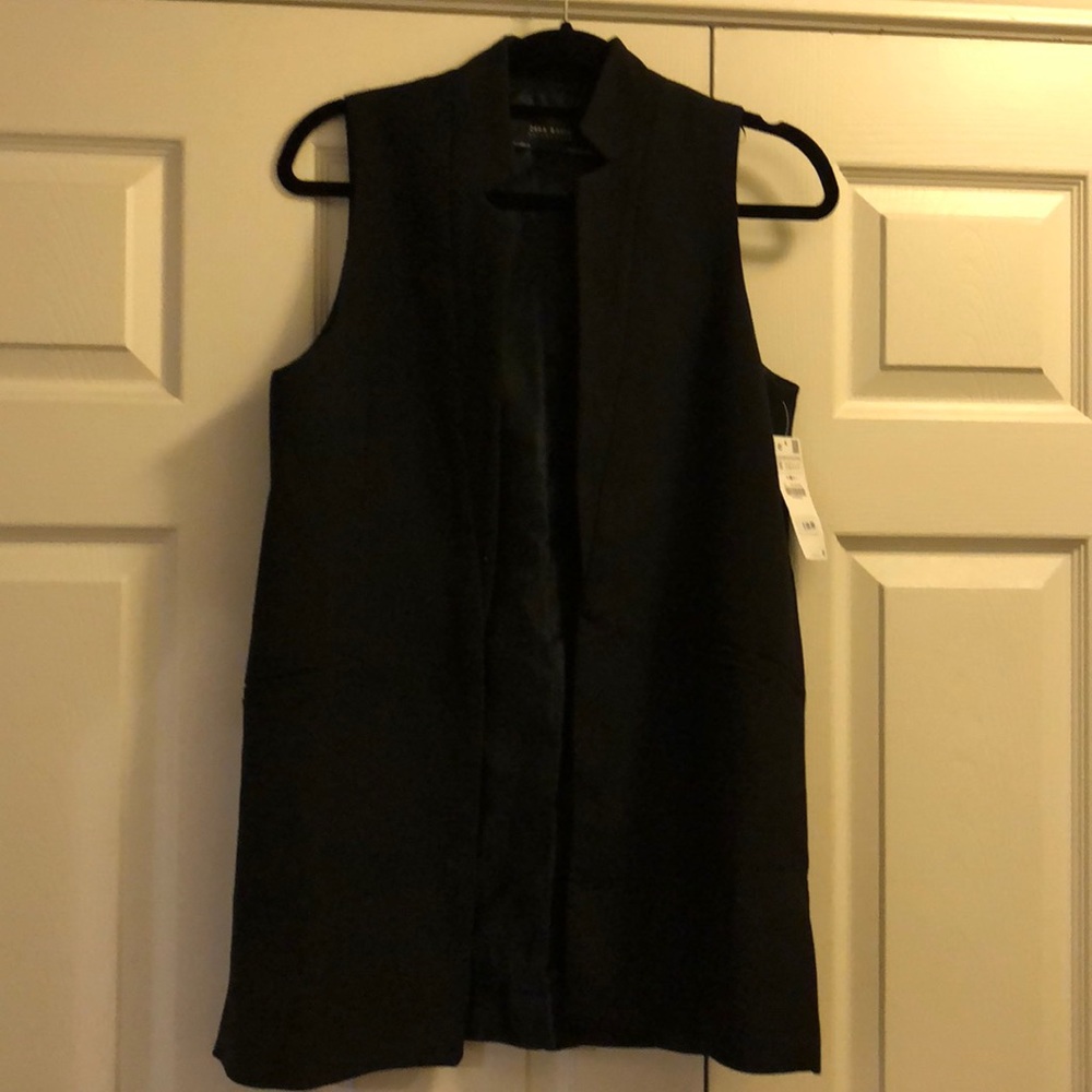 Black sleeveless blazer